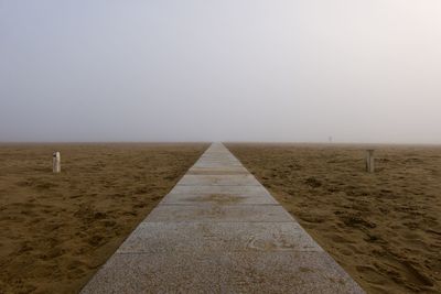 Scenic view of beach against clear sky