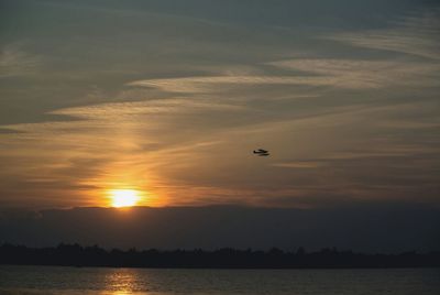 Scenic view of sea at sunset