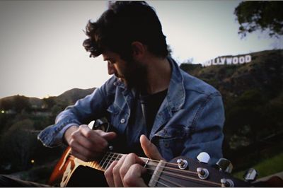 Young man playing guitar