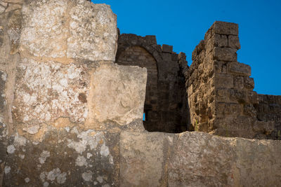 Low angle view of fort against the sky