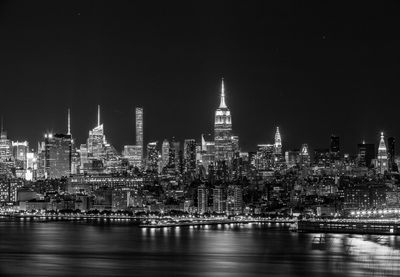 Illuminated buildings in city at night