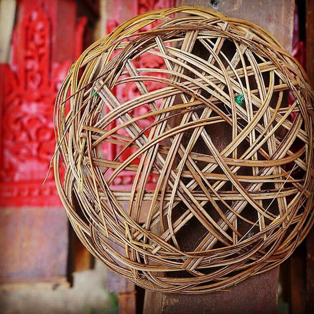 focus on foreground, close-up, art and craft, art, creativity, cultures, red, pattern, metal, indoors, no people, tradition, arts culture and entertainment, built structure, ornate, decoration, day, design, hanging