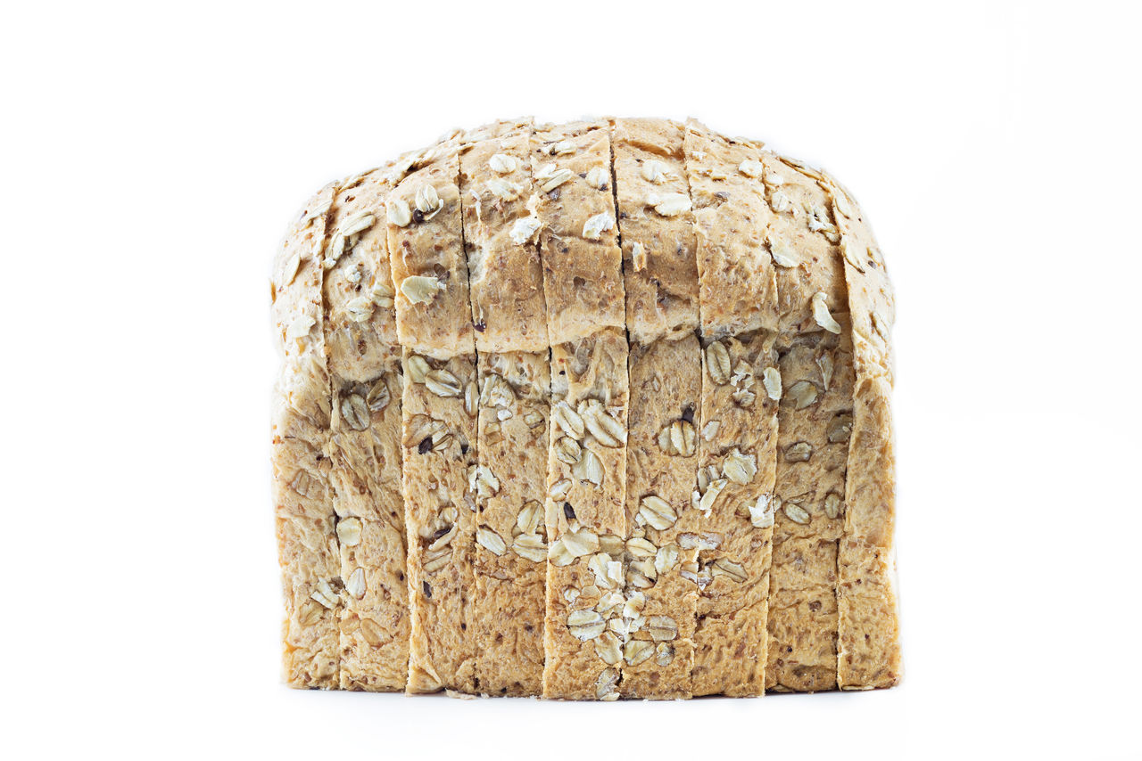 CLOSE-UP OF BREAD ON WHITE BACKGROUND