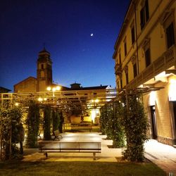 Low angle view of illuminated building at night