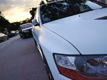 Close-up of car against sky