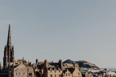 Panoramic view of buildings against clear sky