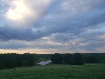 Scenic view of landscape against sky during sunset