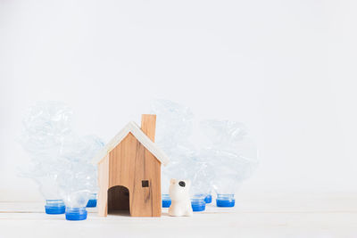 Close-up of objects on table against white background