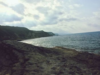 Scenic view of beach against sky