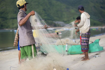 Fishermen working at beach