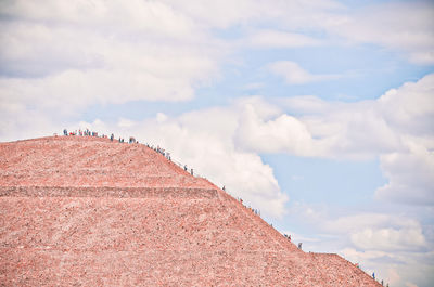 Low angle view of roof and building against sky