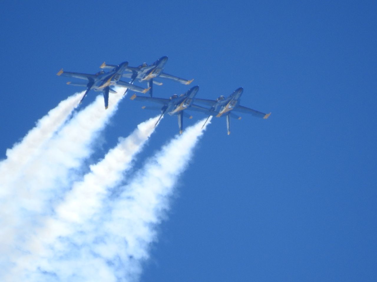 LOW ANGLE VIEW OF AIRPLANE AGAINST SKY