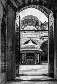 Black and white view of sehzade mosque courtyard from the entrance door, istanbul, turkey