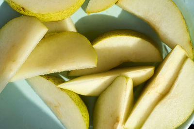 High angle view of fruit slices in plate on table