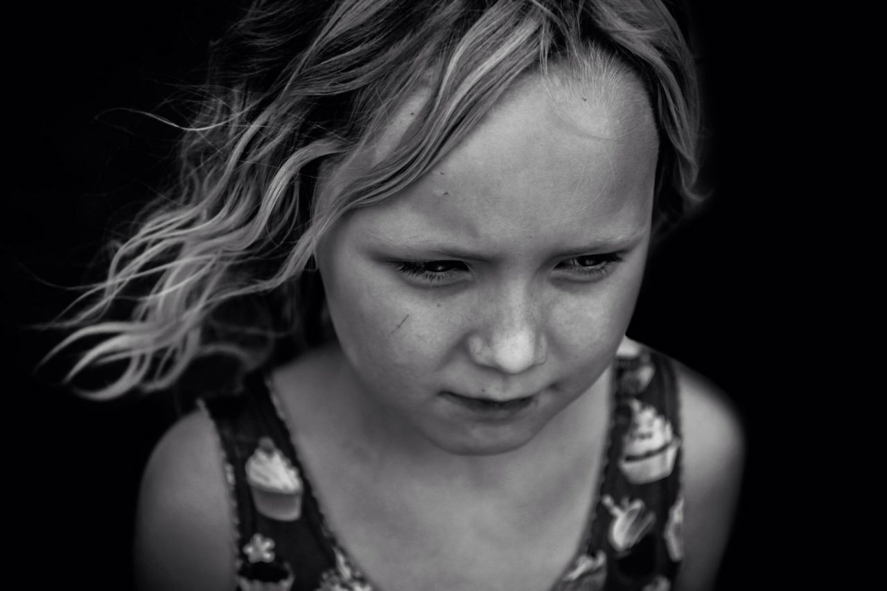 CLOSE-UP PORTRAIT OF A GIRL