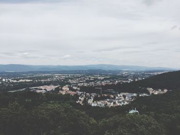 Aerial view of cityscape against sky