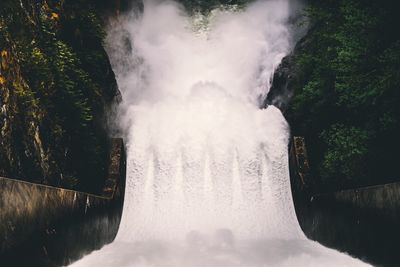 High angle view flowing water in dam