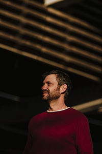 Portrait of young man standing outdoors