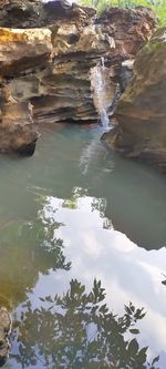 High angle view of rock formation in lake