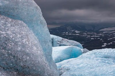 Scenic view of snowcapped landscape against sky