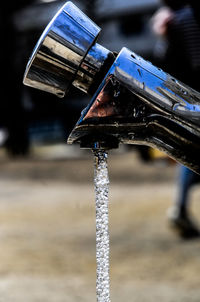 Close-up of water drops on bicycle