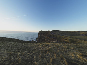 Scenic view of sea against clear sky