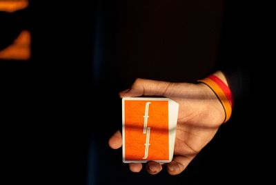 Close-up of hand holding eyeglasses