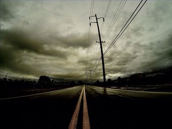 View of road against cloudy sky