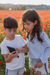 Young woman using mobile phone