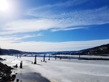 Scenic view of beach against sky