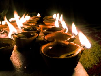 Close-up of burning candles