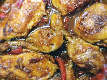 Close-up of meat on barbecue grill