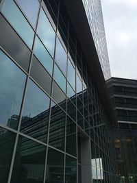 Low angle view of modern building against sky