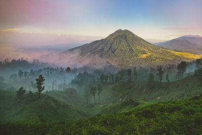 Panoramic view of volcanic landscape against sky during sunset