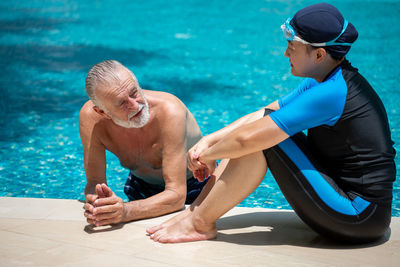 Man swimming in pool