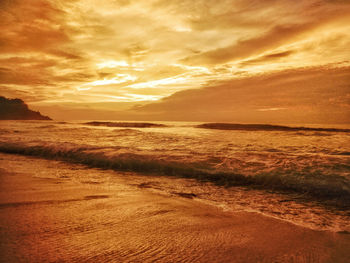 Scenic view of sea against sky during sunset