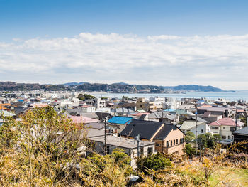 High angle shot of townscape against sky