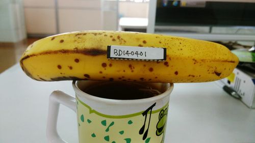 Close-up of coffee cup on table