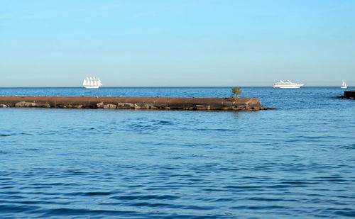 Scenic view of sea against clear sky