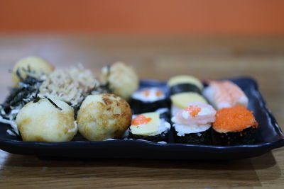 Close-up of sushi in plate on table