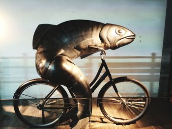 Close-up side view of statue