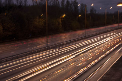 Light trails on road at night