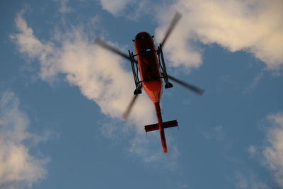 Low angle view of airplane against sky