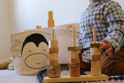 Full length of man playing with toy