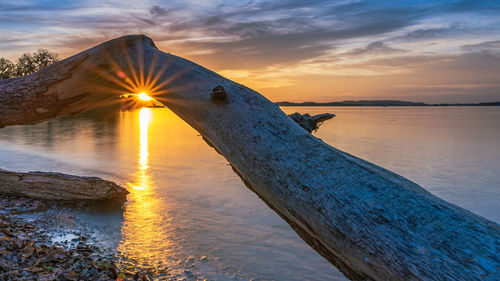 Scenic view of sea against sky during sunset