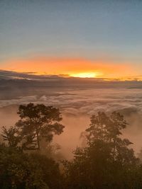 Scenic view of landscape against sky during sunset