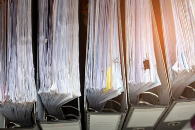 Full frame shot of documents in ring binders at office