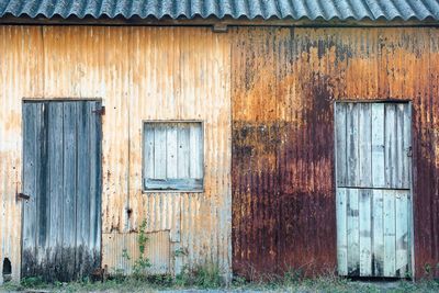 Closed wooden door of house