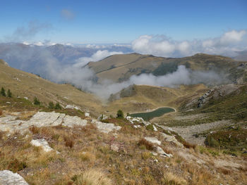 Scenic lake view with mountain panorama near colle sibolet