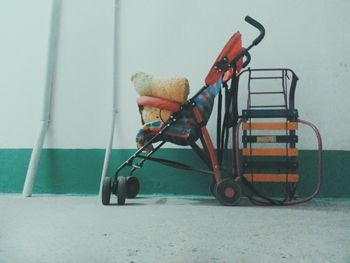 Baby stroller against wall